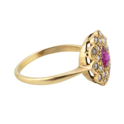 Lot 106 - A GOLD PEARL AND SYNTHETIC RUBY CLUSTER RING
