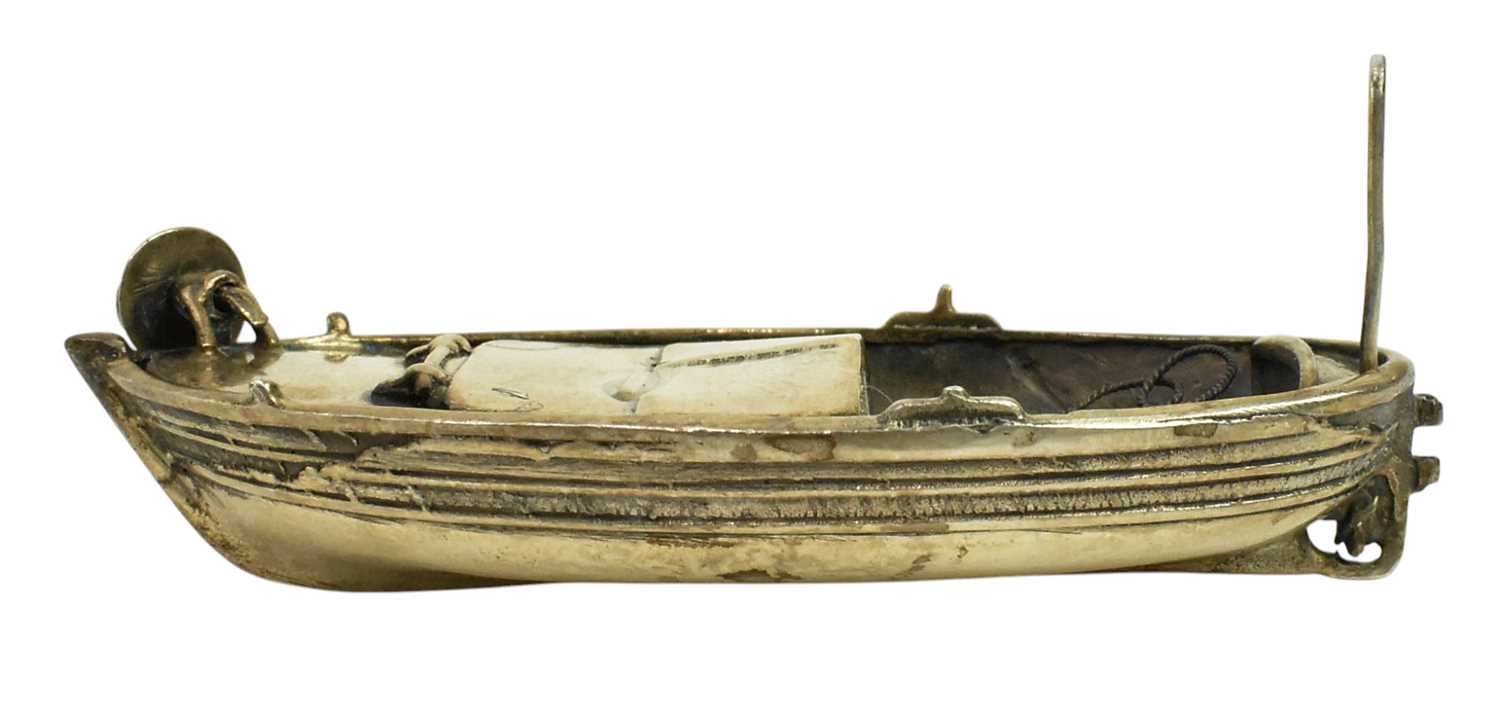 Lot 47 - UNUSUAL SILVER MODEL OF A MINIATURE ROWING BOAT