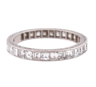 Lot 109 - PLATINUM GOLD & DIAMOND ETERNITY RING