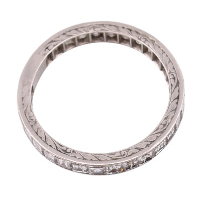 Lot 109 - PLATINUM GOLD & DIAMOND ETERNITY RING