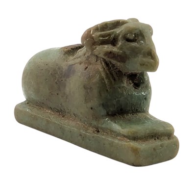 Lot 91 - 18TH DYNASTY GREEN AMULETIC PENDANT OF A CRIOSPHINX