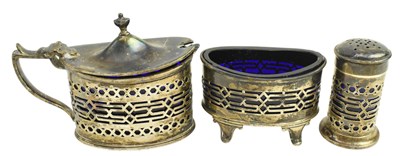 Lot 53 - THREE PIECE HALLMARKED SILVER WITH GLASS LINED CRUET SET