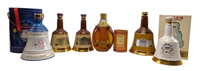 Lot 214 - SIX BELL'S OLD SCOTCH WHISKY COMMEMORATIVE DECANTER T/W ANOTHER