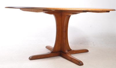 Lot 584 - ERCOL FURNITURE - LATE 20TH CENTURY ELM DINING TABLE