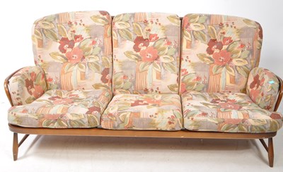 Lot 571 - ERCOL JUBILEE RANGE MID CENTURY BEECH THREE SEATER SOFA