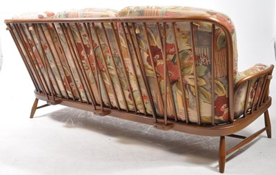 Lot 571 - ERCOL JUBILEE RANGE MID CENTURY BEECH THREE SEATER SOFA