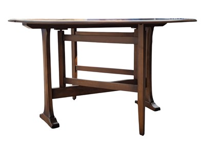 Lot 636 - ERCOL FURNITURE - 20TH CENTURY BEECH & ELM DROP LEAF DINING TABLE