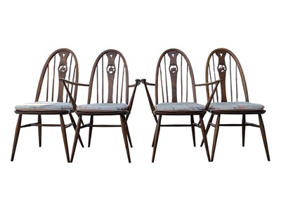 Lot 635 - ERCOL FURNITURE - FOUR SWAN BACK WINDSOR DINING CHAIRS