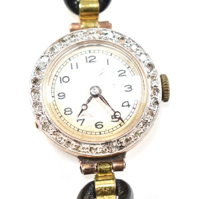 Lot 159 - HALLMARKED 18CT GOLD AND DIAMOND COCKTAIL WATCH