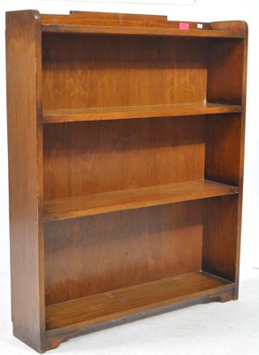 Lot 710 - OAK OPEN FOUR SHELF BOOKCASE WITH RAISED DETAIL TO GALLERIED TOP