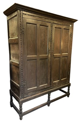 Lot 276 - 18TH CENTURY CARVED OAK VESTRY CUPBOARD ON STAND