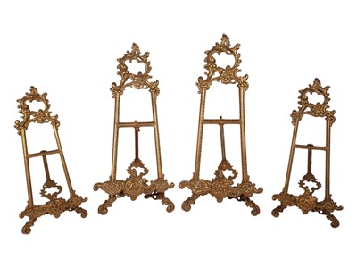 Lot 211 - FOUR 20TH CENTURY ROCOCO STYLE BRASS TABLE TOP EASELS