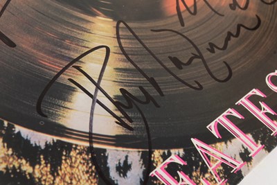 Lot 63 - ROXY MUSIC (BAND) - TRIPLE-SIGNED 12" VINYL RECORD 'GREATEST HITS'
