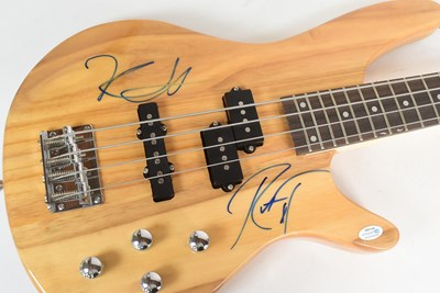 Lot 30 - METALLICA (BAND) - DUAL AUTOGRAPHED BASS GUITAR - ACOA