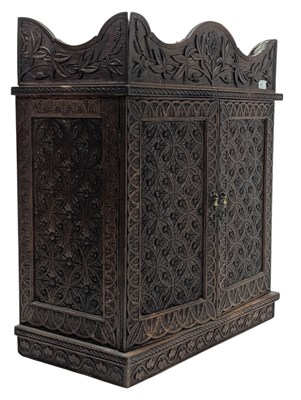 Lot 574 - ANGLO-INDIAN 19TH CENTURY CARVED OAK TWIN DOOR CABINET