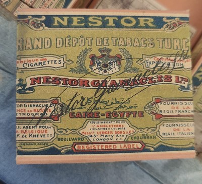 Lot 15 - TOBACCIANA. EDWARDIAN IRON BOX OF ORIGINAL NESTOR CIGARETTE BOXES WITH CONTENTS