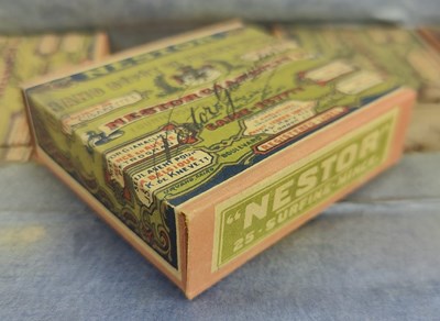Lot 15 - TOBACCIANA. EDWARDIAN IRON BOX OF ORIGINAL NESTOR CIGARETTE BOXES WITH CONTENTS