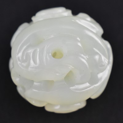 Lot 175 - QING DYNASTY PALE CELADON JADE CARVED WITH "DOUBLE DRAGONS" 清 青白玉 双龙吊锤