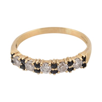 Lot 326 - HALLMARKED 9CT GOLD SAPPHIRE CZ HALF HOOP RING