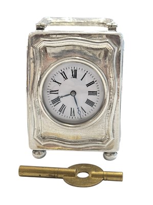 Lot 74 - 20TH CENTURY STERLING SILVER MINIATURE TRAVEL CLOCK