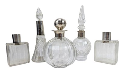 Lot 102 - FIVE 20TH CENTURY HALLMARKED SILVER & CUT GLASS SCENT PERFUME BOTTLES