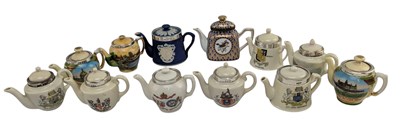 Lot 77 - COLLECTION OF TWELVE CERAMIC MINIATURE TEAPOTS