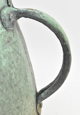 Lot 129 - 18TH CENTURY PERSIAN HAMMERED COPPER TWIN HANDLED VESSEL