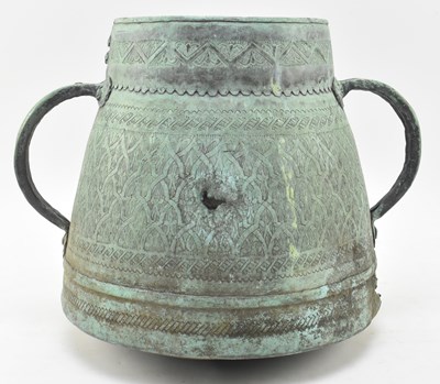 Lot 129 - 18TH CENTURY PERSIAN HAMMERED COPPER TWIN HANDLED VESSEL