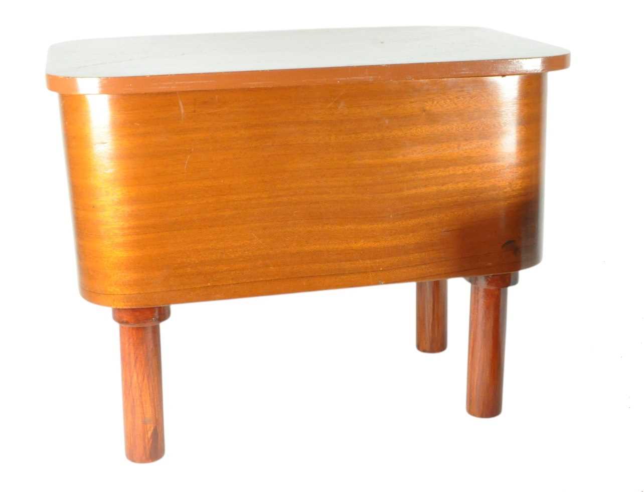 Lot 566 - MORCO FURNITURE - A MID 20TH CENTURY MORCO WALNUT SEWING BOX