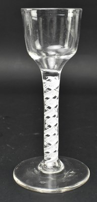 Lot 97 - TWO GEORGE II / III OPAQUE TWIST STEM WINE GLASSES