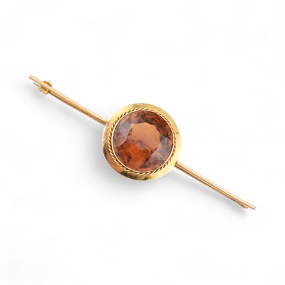 Lot 453 - EARLY 20TH CENTURY GOLD & CITRINE BROOCH