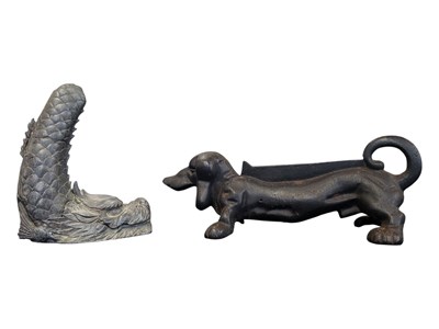 Lot 260 - 20TH CENTURY CAST IRON DOG BOOT SCRAPER AND SPELTER POND SPITTER