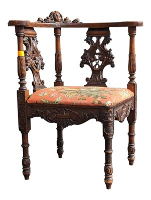 Lot 745a - A 19TH CENTURY VICTORIAN CARVED OAK CORNER ARMCHAIR