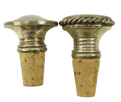Lot 96 - 20TH CENTURY SILVER BOTTLE STOPPER & A WHTE METAL STOPPER