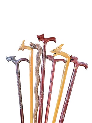 Lot 282 - COLLECTION OF INTAGE 20TH CENTURY WOODEN CARVED DRAGON HEADED WALKING STICKS