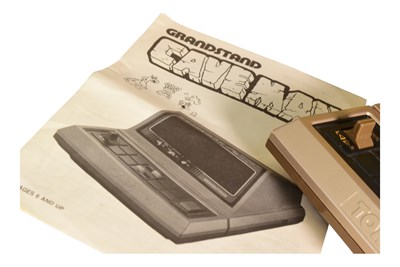 Lot 585 - RETRO GAMING - VINTAGE GRANDSTAND CAVEMAN ELECTRONIC ARCADE GAME