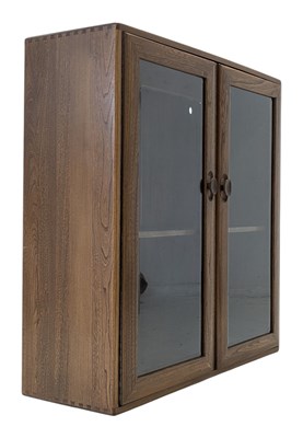 Lot 119 - ERCOL - WINDSOR RANGE - MID CENTURY 1970S ELM WALL CABINET