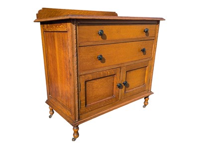 Lot 712 - 1920S GOLDEN OAK ARTS & CRAFTS OAK CHEST OF DRAWERS TALLBOY