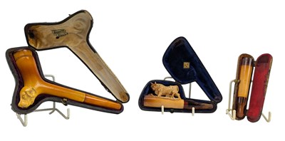 Lot 37 - THREE 19TH CENTURY & LATER HAND-CARVED MEERSCHAUM CIGAR & CHEROOT HOLDERS