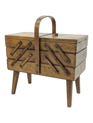 Lot 847 - BRITISH MODERN DESIGN - MID 20TH CENTURY TEAK CANTILEVER SEWING BOX