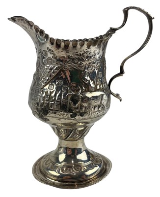 Lot 34 - GEORGE III HALLMARKED SILVER REPOUSSE CREAMER JUG 1775 LONDON