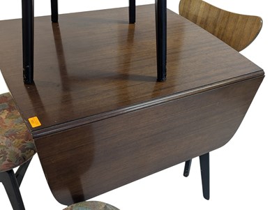 Lot 880 - ERNEST GOMME FOR G-PLAN FURNITURE - BUTTERFLY TABLE & CHAIRS