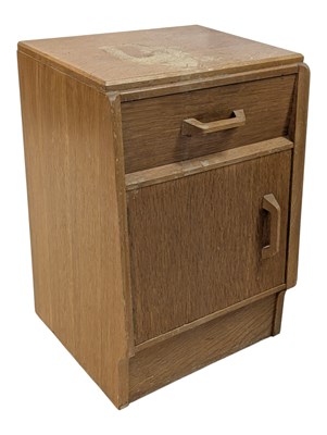 Lot 883 - ERNEST GOMME FOR G-PLAN FURNITURE - PAIR OF OAK BEDSIDE CABINETS