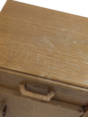 Lot 883 - ERNEST GOMME FOR G-PLAN FURNITURE - PAIR OF OAK BEDSIDE CABINETS