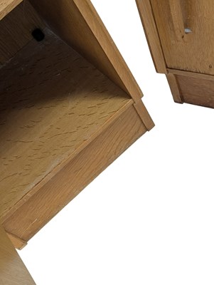 Lot 883 - ERNEST GOMME FOR G-PLAN FURNITURE - PAIR OF OAK BEDSIDE CABINETS
