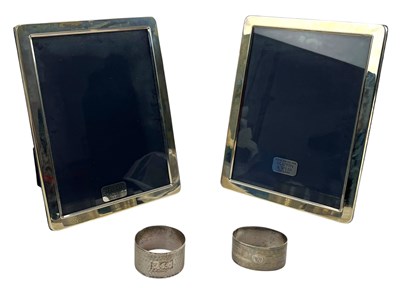 Lot 140 - PAIR OF HALLMARKED SILVER PHOTO FRAMES BY MAPPIN & WEBB & TWO SILVER NAPKIN RINGS