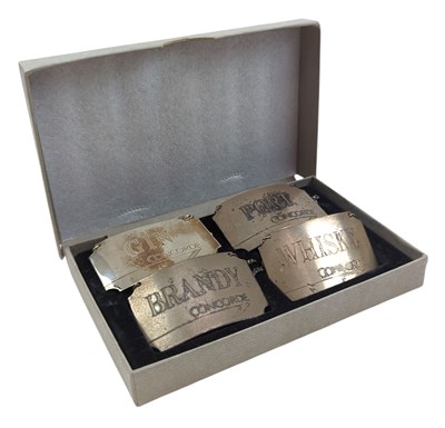 Lot 148 - BRISTISH AIRWAYS - SET OF FOUR HALLMARKED SILVER DECANTER LABELS