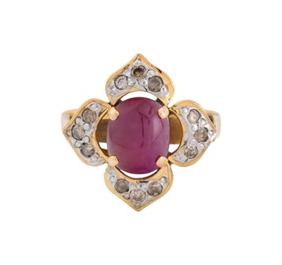 Lot 560 - RUBY & DIAMOND HALO RING