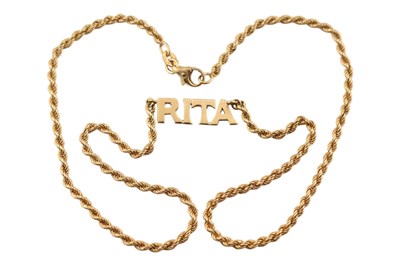 Lot 369 - GOLD RITA NAME ID PENDANT NECKLACE