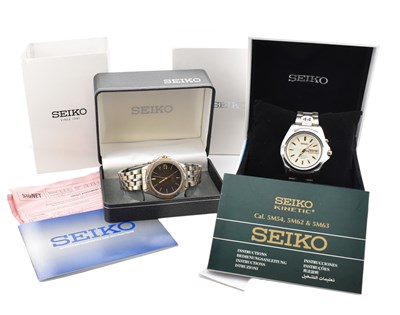 Lot 362 - TWO CASED SEIKO KINETIC STAINLESS STEEL WRISTWATCHES